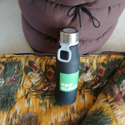 Matching Brown Sleeping Bags with Duck Print Lining & Bottle