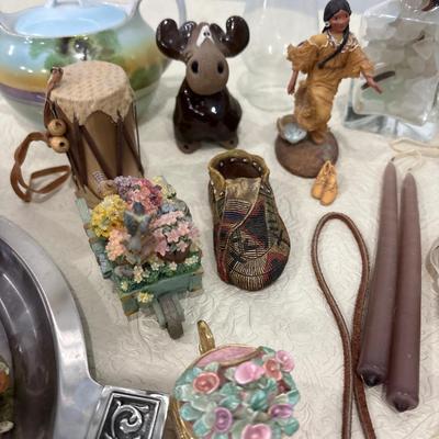 Silver tray with figurines and decor