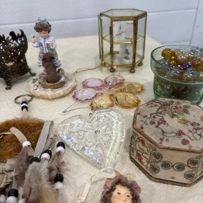 Silver tray with figurines and decor