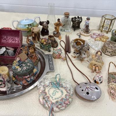 Silver tray with figurines and decor