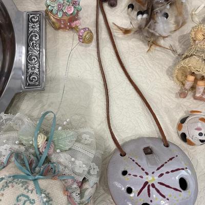 Silver tray with figurines and decor