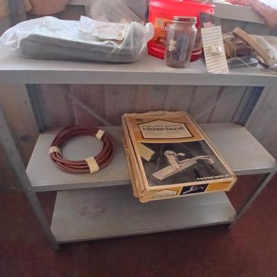 Heavy-Duty 5-Shelf Metal Storage Rack with home hardware contents