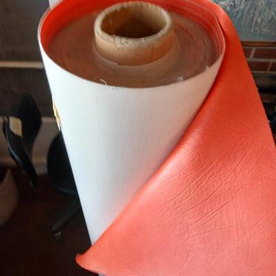 Large Roll of Orange Textured Vinyl Upholstery Fabric