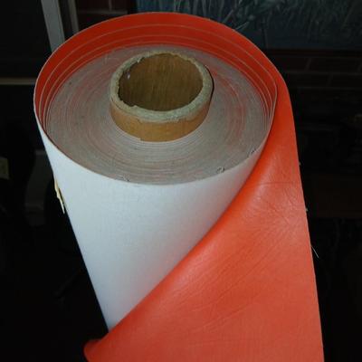 Large Roll of Orange Textured Vinyl Upholstery Fabric