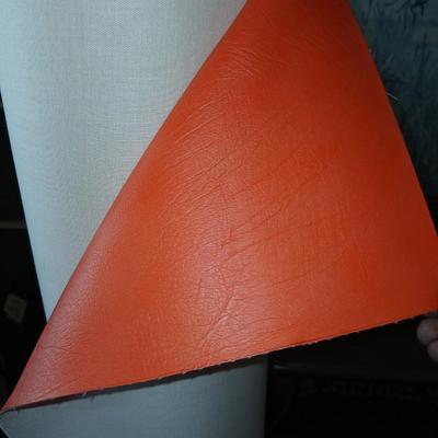 Large Roll of Orange Textured Vinyl Upholstery Fabric