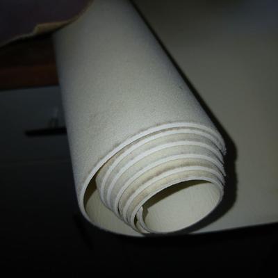 Upholstery and Crafting Materials – Scraps of Vinyl, and small roll of leather
