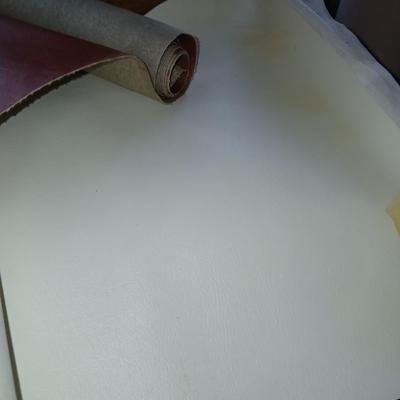 Upholstery and Crafting Materials – Scraps of Vinyl, and small roll of leather