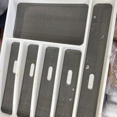 Paper and plastic goods with silverware and drawer organizer