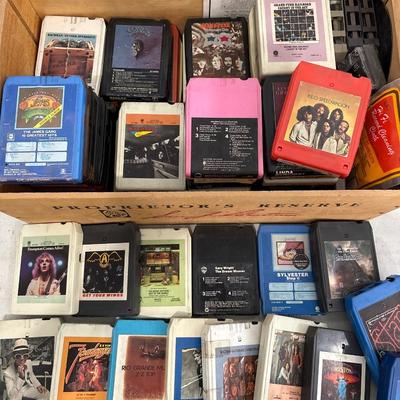 Vintage 1970s/80s eight track tapes in wine crate