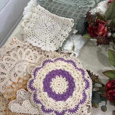 Crocheted doilies, floral and decor