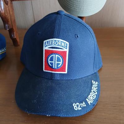 Branded & Military Cap Lot – Ferrari, NAPA, Ritz, 82nd Airborne + More with hat rack