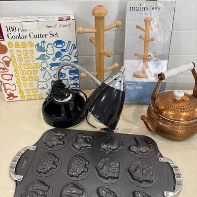 Lamp, cookie cutters, and kitchen items