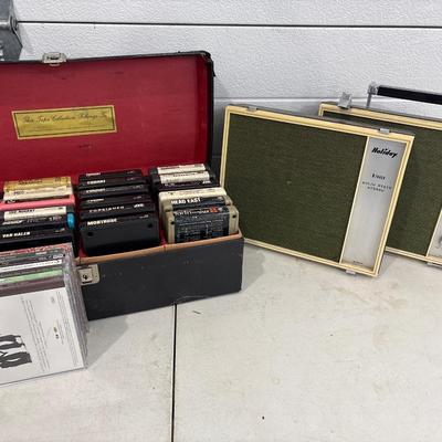 Vintage Holiday 8-track stereo with a case and tapes