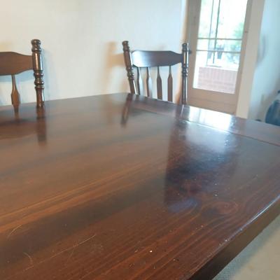 Solid Wood Dining Table with 8 Matching Spindle-Back Chairs and two leaves