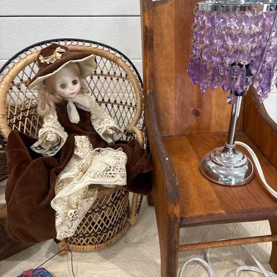 Basket, shelves, doll, chairs, and more