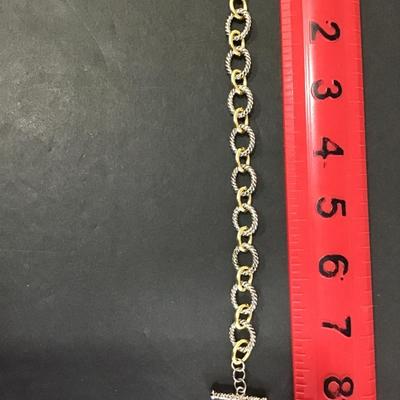 Silver and gold tone bracelet