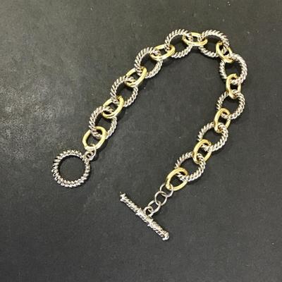 Silver and gold tone bracelet