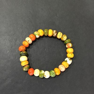 Stretchy bracelet with polished earth stones beads