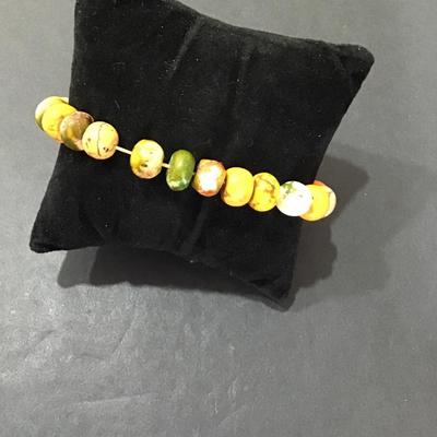 Stretchy bracelet with polished earth stones beads