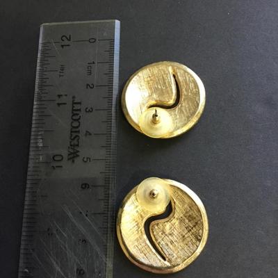 Gold toned red enameled circular stud earrings