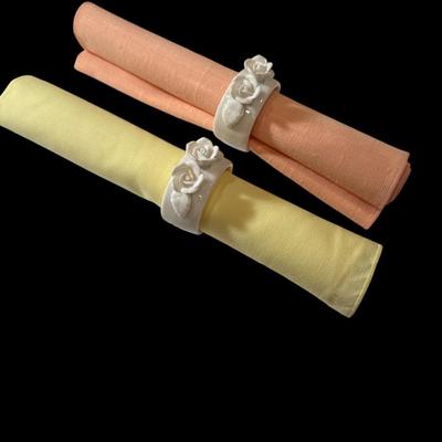 14 Napkin Rings and assorted napkins