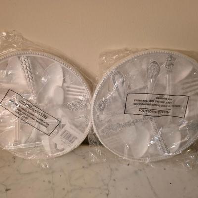Pair of decorative metal trivets