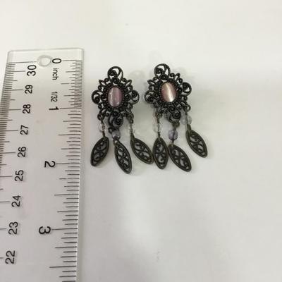 Cute, antique bronze, toned earrings with pink stone