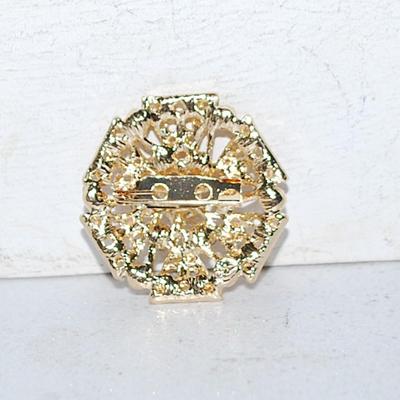 Six Triangles of Dark and Light Colored Purple Stones BROOCH (1¼" Diam.) on a Gold Tone Setting