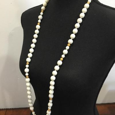 Vintage very nice white milk glass bead necklace with a gold toned accent is very nice necklace
