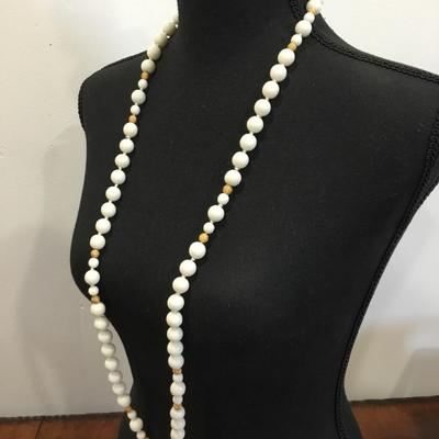 Vintage very nice white milk glass bead necklace with a gold toned accent is very nice necklace