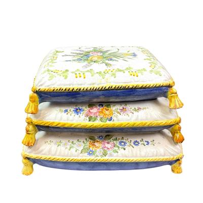 Sale Photo Thumbnail #1494: Ceramic and glazed Italian pottery depicting three stacked pillows , top pillow opens up for storage 
Measures: 22" wide x 17" deep x 14" high