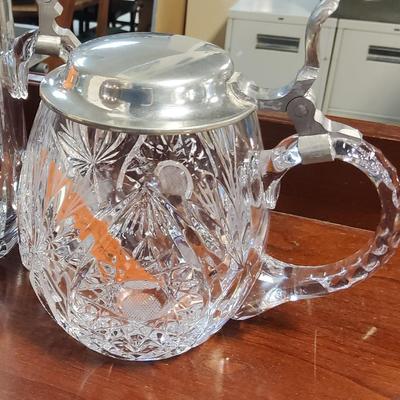 Sale Photo Thumbnail #64: Pair of cut crystal steins with pewter lids. Available for inspection during regular business hours, ask for Kelly or Anne