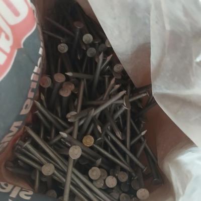 Two drawers full of assorted home hardware - nails - screws - mixed hardware
