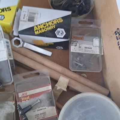Two drawers full of assorted home hardware - nails - screws - mixed hardware