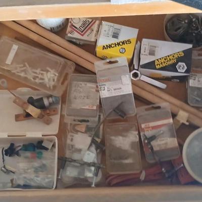 Two drawers full of assorted home hardware - nails - screws - mixed hardware
