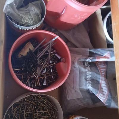 Two drawers full of assorted home hardware - nails - screws - mixed hardware