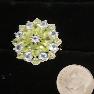 Peridot cluster with blue spinel accents ring
