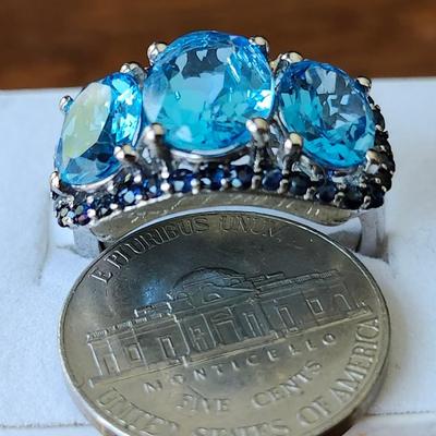 Topaz with blue spinel accent ring