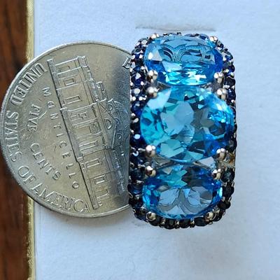 Topaz with blue spinel accent ring