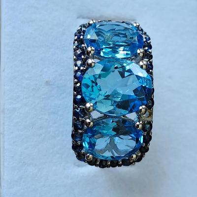 Topaz with blue spinel accent ring