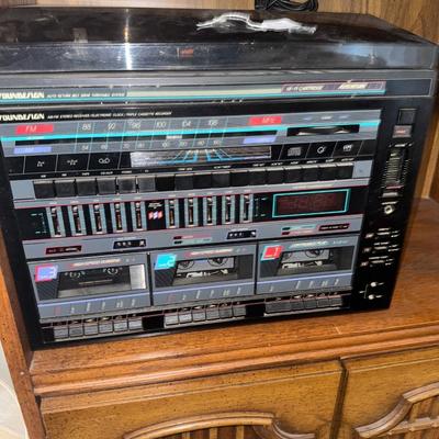 PAIR OF SHELVES WITH CASSETTE PLAYER AND SPEAKERS