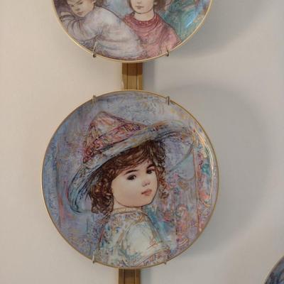 Collection of Edna Hibel Collector's Plates with Wall Hangers- Set of Four