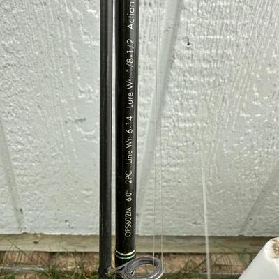 2 FISHING POLES WITH REELS AND A COOLER