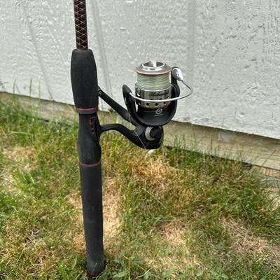 2 FISHING POLES WITH REELS AND A COOLER