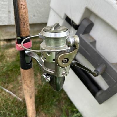 2 FISHING POLES WITH REELS AND A COOLER