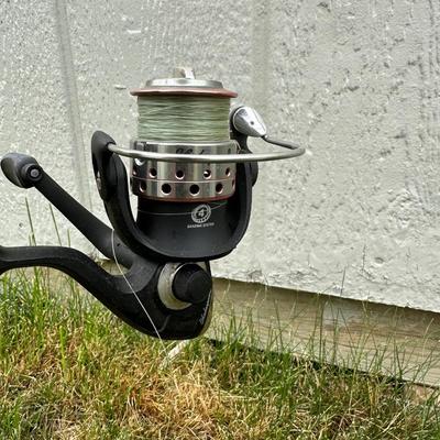 2 FISHING POLES WITH REELS AND A COOLER