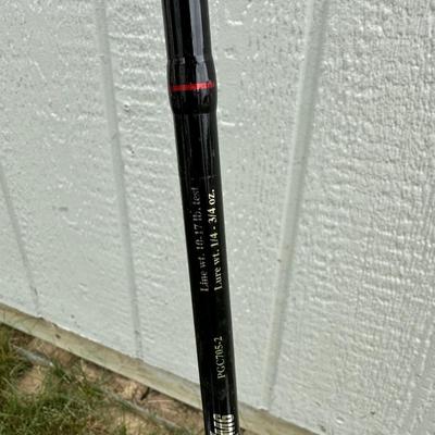 FISHING POLES, REELS AND SECTIONED CABELA'S BOXES