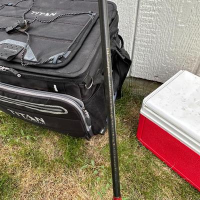 FISHING POLES WITH REELS, SOFT SIDED TITAN COOLER AND AN AUTO TRASH BIN