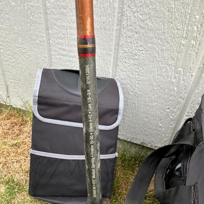 FISHING POLES WITH REELS, SOFT SIDED TITAN COOLER AND AN AUTO TRASH BIN