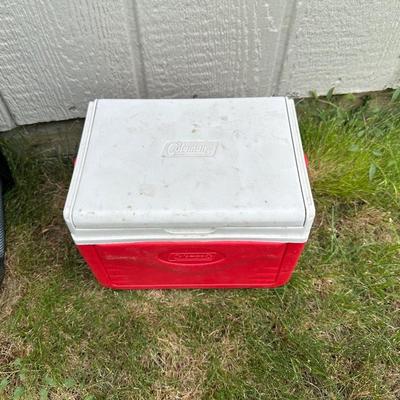FISHING POLES WITH REELS, SOFT SIDED TITAN COOLER AND AN AUTO TRASH BIN